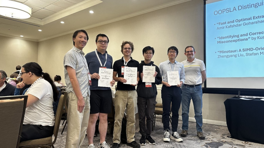 From left to right: Dr. Lionel Parreaux (Left 3), Mr. Lam Chun Kit (Left 4), and Dr. Alex Potanin, the Review Committee Co-Chair (Right).