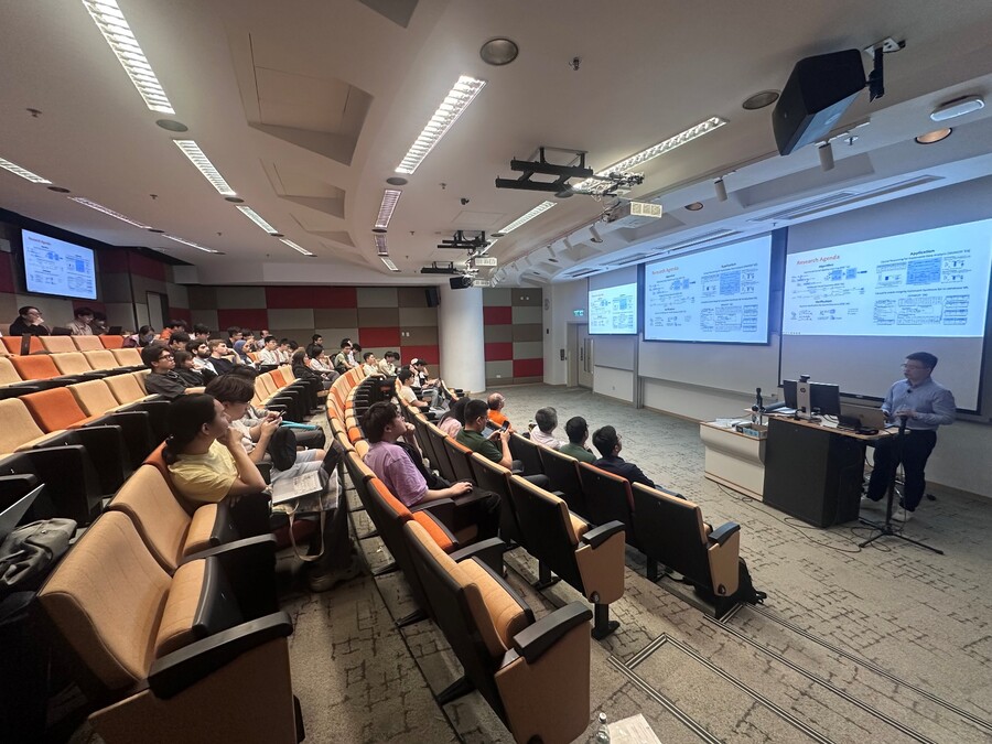 Dr. Ma delivering an engaging and insightful talk to the audience.