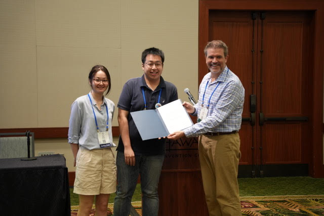 CSE PhD student Haotian LI (Center) and Dr. Yun Wang (Left) receiving Best Paper Honorable Mention Award