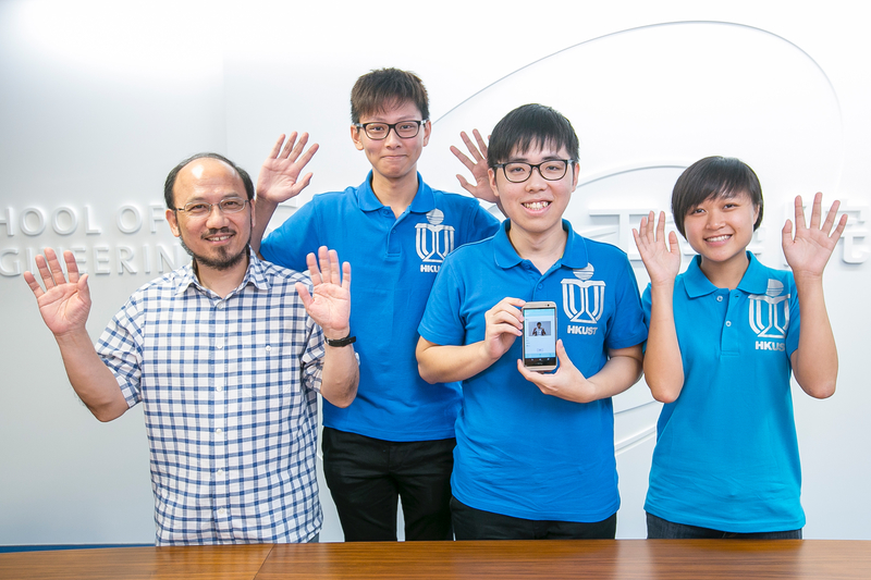 (from left) HKUST's Prof Brian Mak and students - Kelvin Yung, Ken Lai and Mary Leung - demonstrating how to say "clap hands" in sign language.