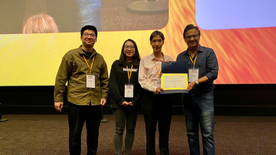 (From left) Dr. Weicheng Wang, Dr. Min Xie, and Prof. Raymond Wong receiving the Best Paper Award at ICDE 2024.