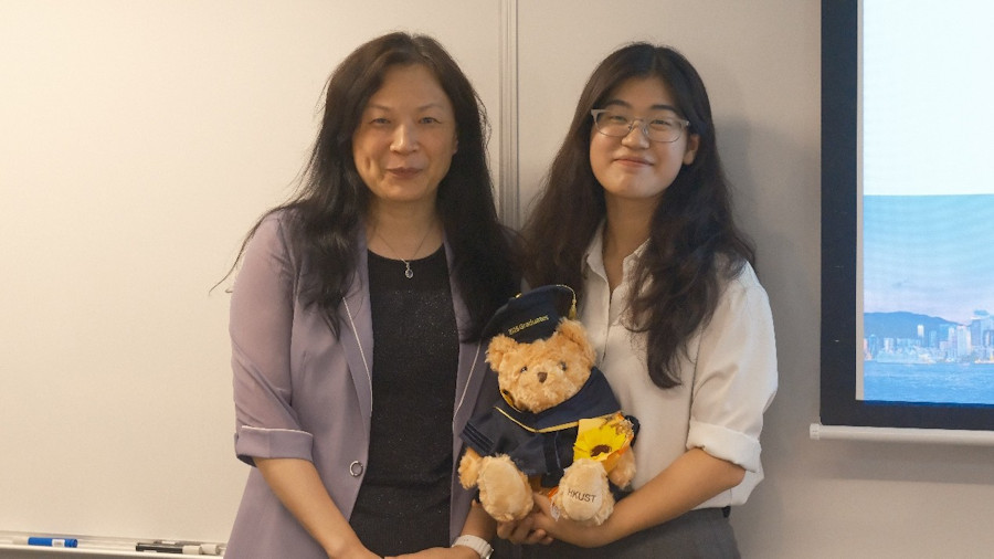 Haiyan Hu with her PhD supervisor, Prof. Qian Zhang, following her doctoral thesis defense at HKUST.