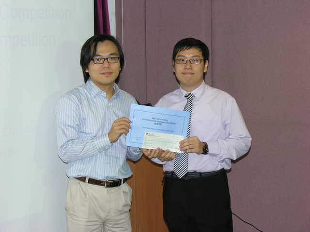 Warner (Right) at the Award Presentation Ceremony