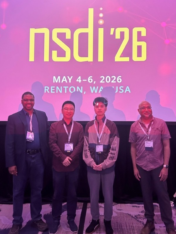 From left to right, Hakim Weatherspoon (Conference Program Co-Chair), Wei Wang, Lunxi Cao (co-first student author), Srikanth Kandula (Conference Program Co-Chair).